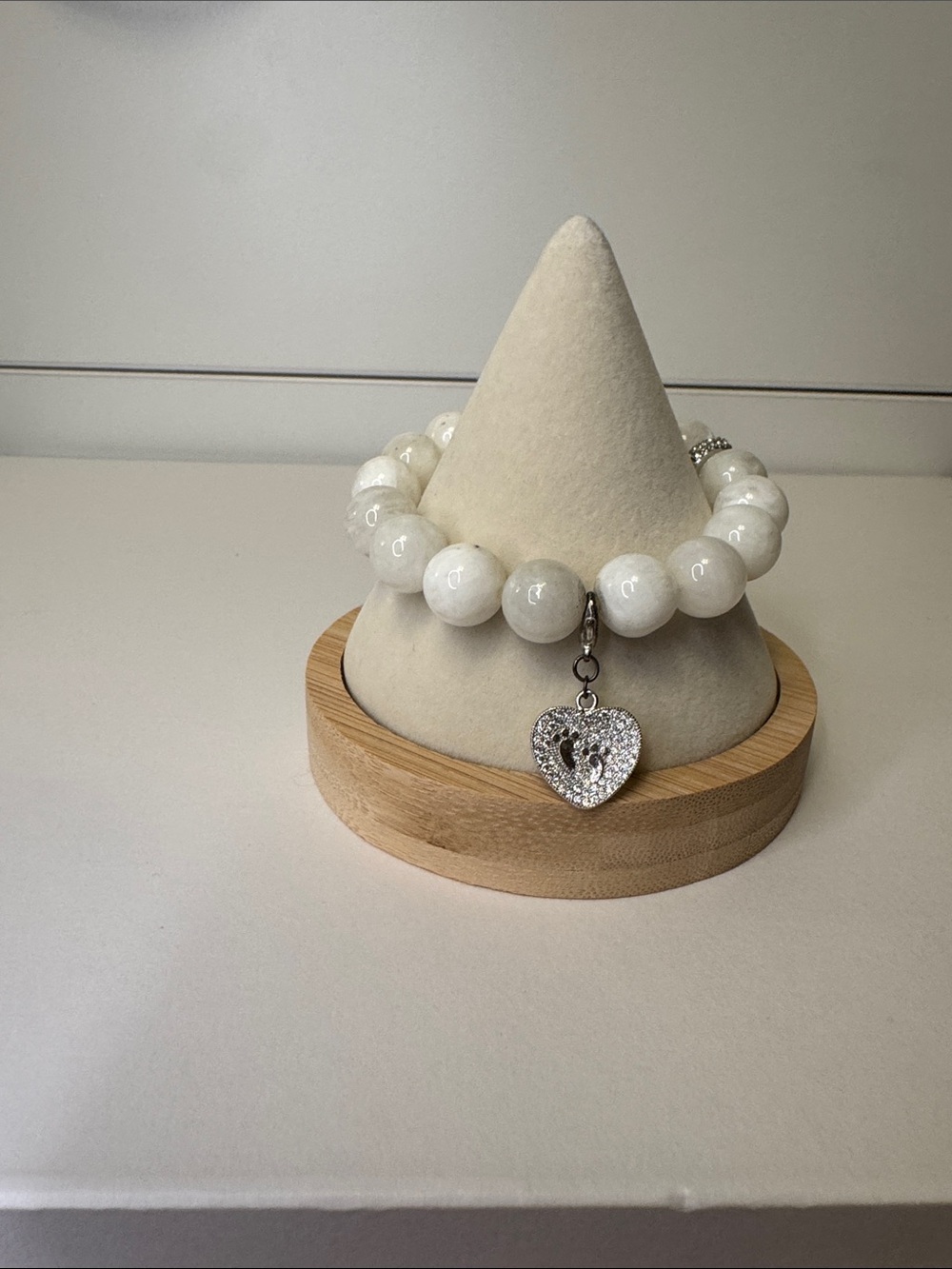 White Beaded Stretch Bracelet with Silver Pave & Heart Footprint Charms